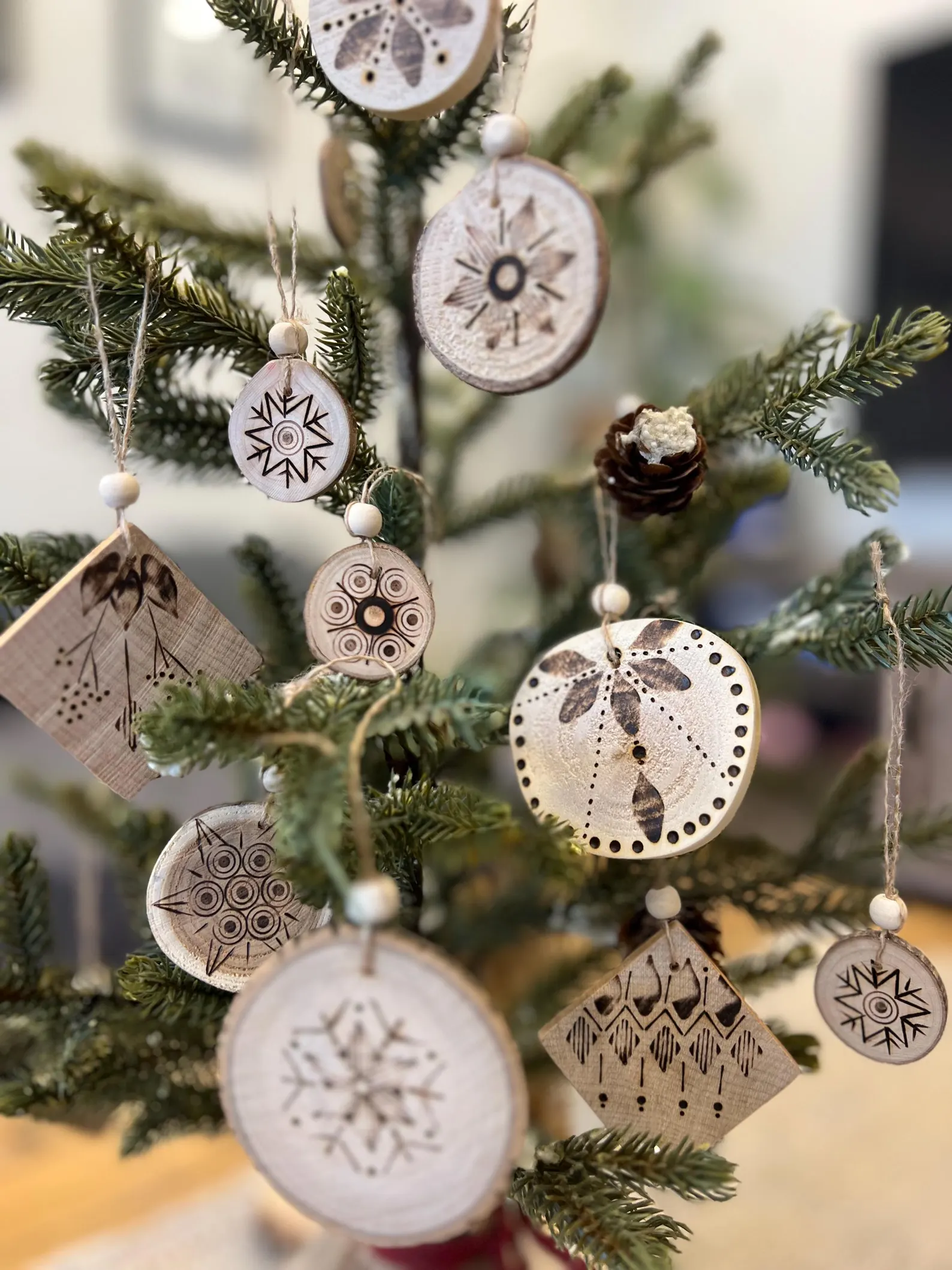 Unique handmade rustic wood burned ornament, 2.25 inches, perfect for holiday decorations or gifts.