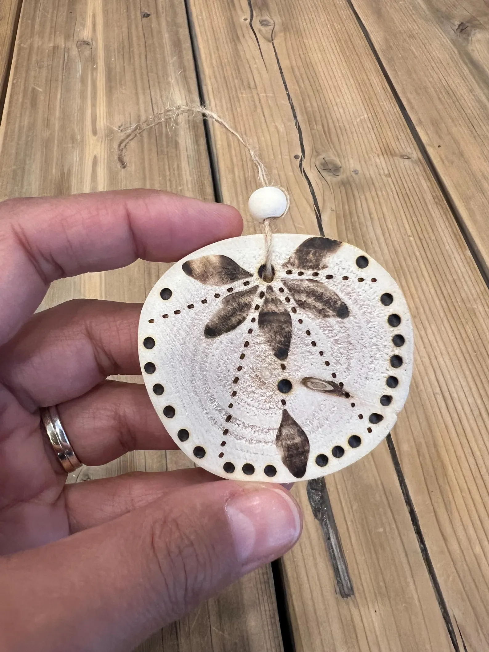 Unique rustic wood burned ornament, handmade in Canada, perfect for holiday decorations or gifts.