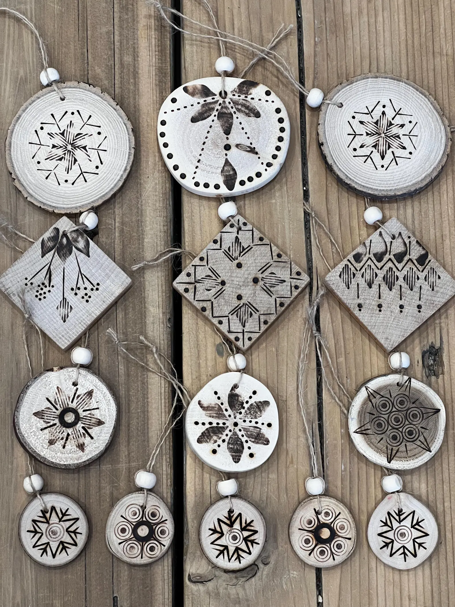 Unique rustic wood burned ornament, handcrafted in Canada, perfect for holiday decorations. Size: 2.25 inches.