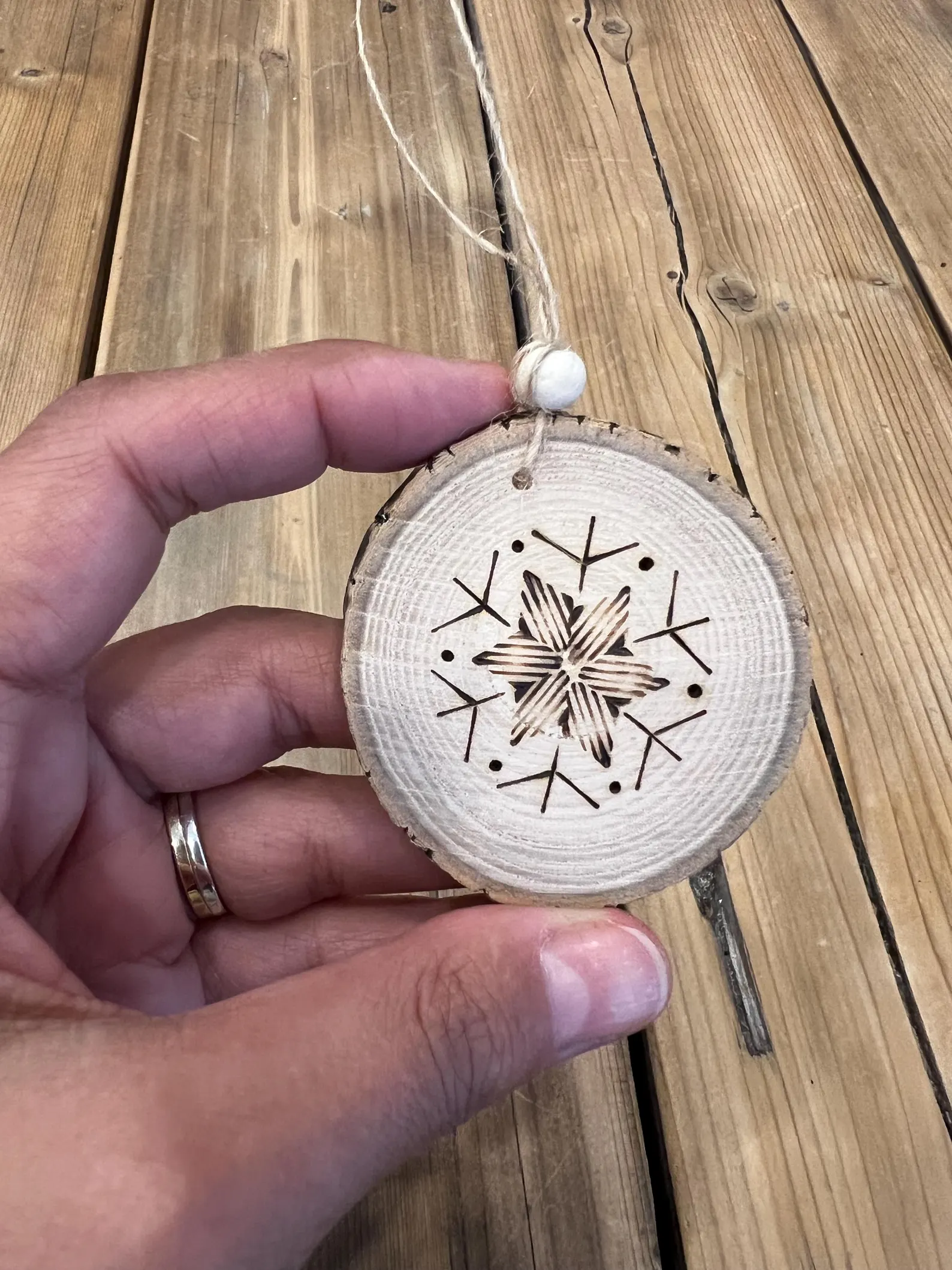 Unique rustic wood burned ornaments, handmade in Canada, perfect for holiday decorations. Each ornament measures 2 1/4 inches.