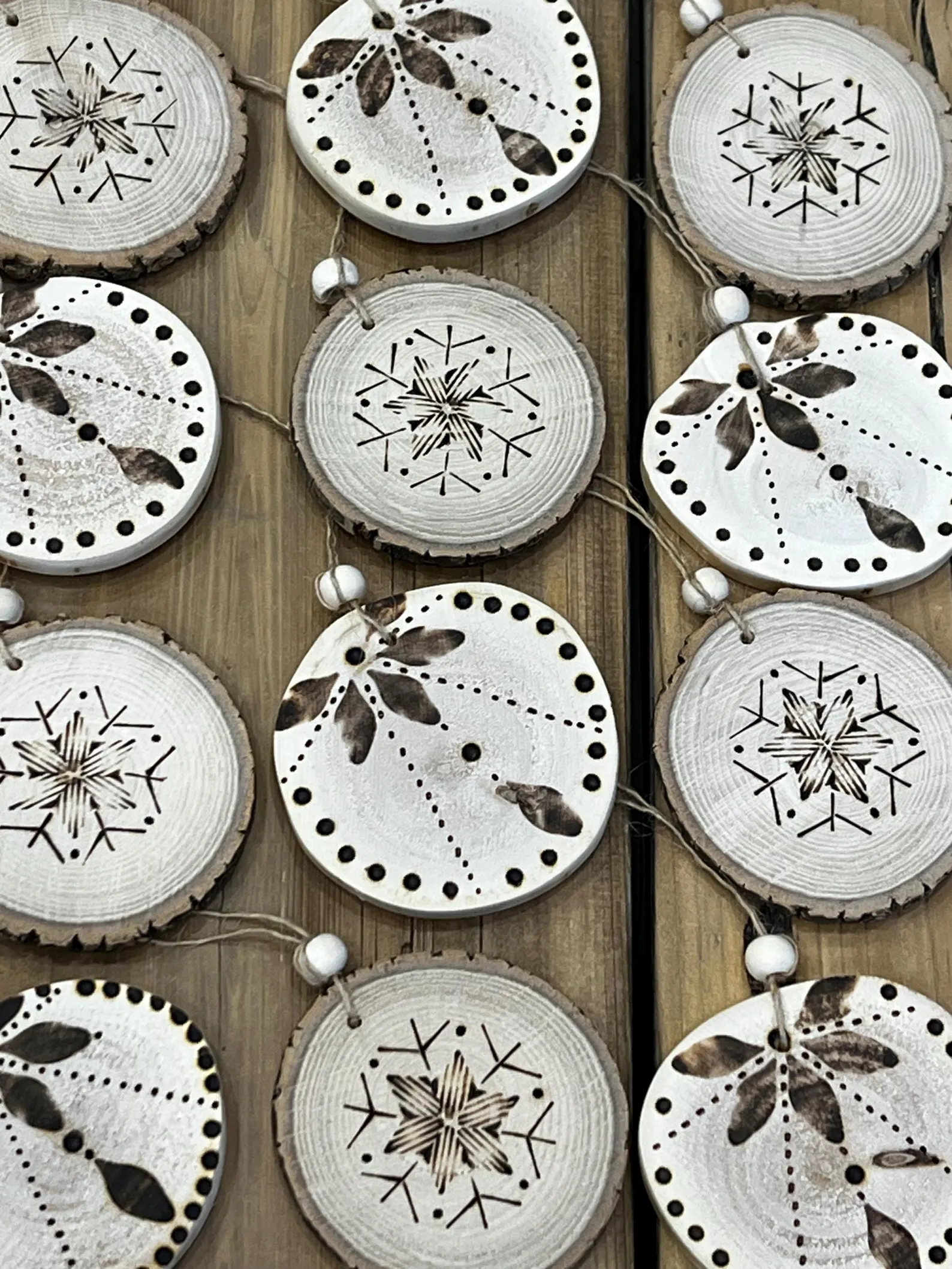 Handcrafted rustic wood burned ornament, 2.25 inches, perfect for Christmas tree or gifts, eco-friendly design by Studio27 Origins.